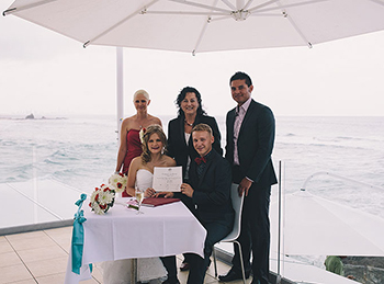 Olga and Alex were married my Marry Me Marilyn on the deck of the Currumbin Beach Surf Lifesaving Club